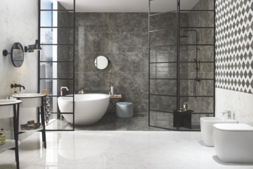 Fliesendorf zeigt ein sehr modernes Badezimmer in schwarz weiß mit Lofttüren, freistehender Badewanne, Doppelwaschtisch und Toilette.
