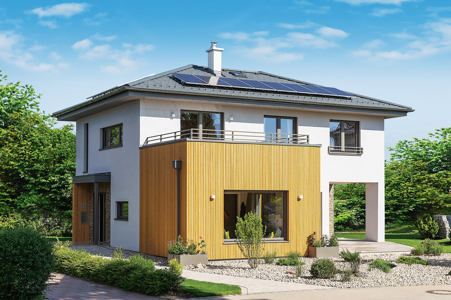 Wohnhaus mit Photovoltaik-Anlage am Dach, Balkon, überdachter Terrasse und teilweiser Holzfassade von HARTL HAUS.