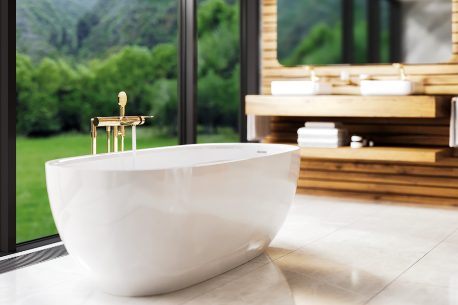 Das Design von „Exal“ in glänzendem Edelmessing ist durchgängig für die zentralen Badbereiche umgesetzt. Der schlichte Partner des exklusiven Finishs ist Weiß. Kombiniert mit warmen Holztönen wirkt der sonnige Luxus besonders atmosphärisch und wohnlich.