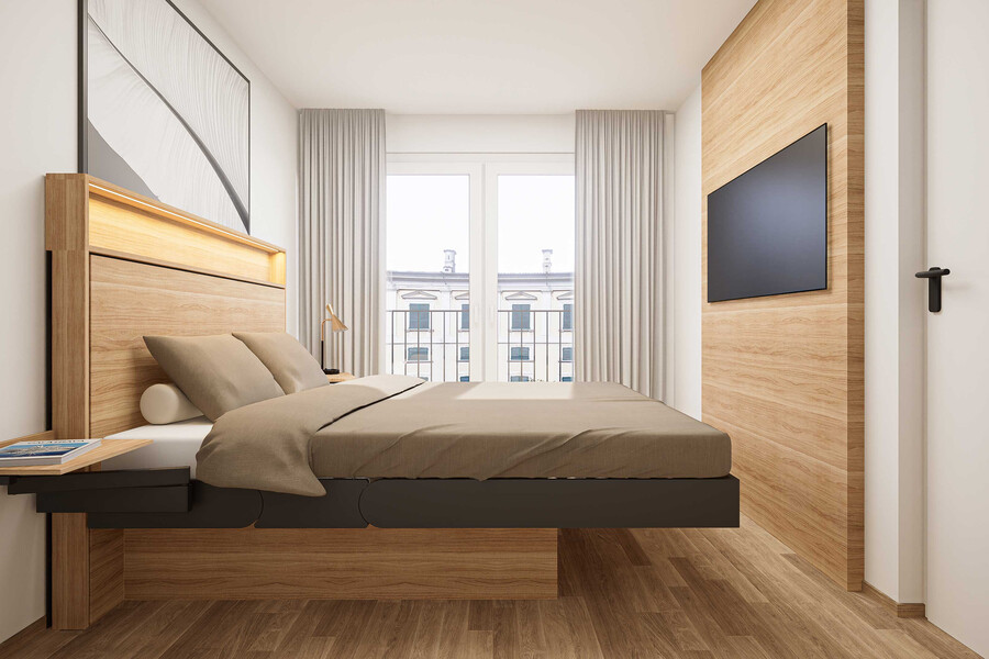 Kitzberger-Pondell präsentiert ein Hotelzimmer mit aufgefahrenem Doppelbett Versa.