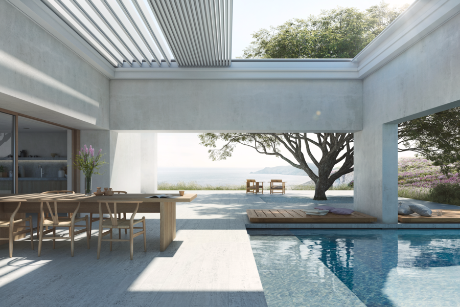 WAREMA zeigt eine Außenanlage in Betonoptik mit überdachter Terrasse mit einer Essgruppe aus Holz, Liegen und Zugang zum Pool mit Aussicht ins Grüne.