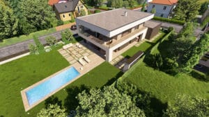 Eine moderne Villa mit Flachdach, überdachtem Terrassenbereich, Garage, Garten, Outdoormöbeln, Pool und einem Rund-um-Balkon mit Nurglasgeländer von AL Architekt ZT GmbH.