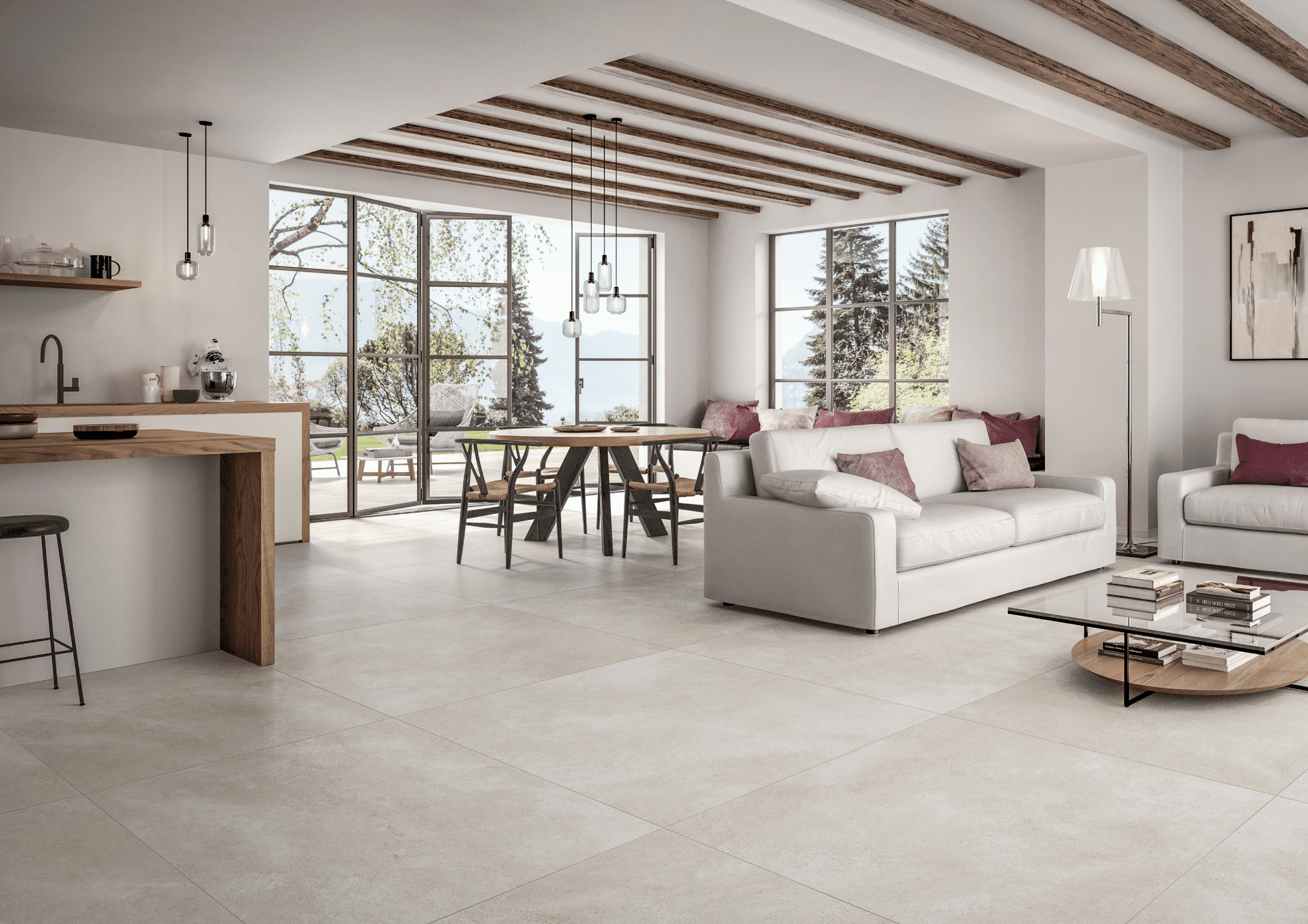 C. Bergmann zeigt ein hell gefliestes Wohnzimmer mit einer gepolsterten Couch, einen Esssbereich mit einem Tisch und Stühlen aus Holz und Zugang zur Terrasse von Villeroy and Boch.