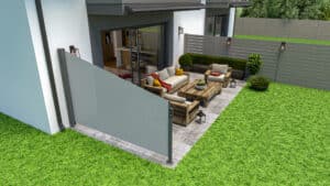 Einfamilienhaus mit Terrasse, Garten und einer als Sicht- und Wetterschutz montierte Seitenmarkise in Grau von DolenzGollner.