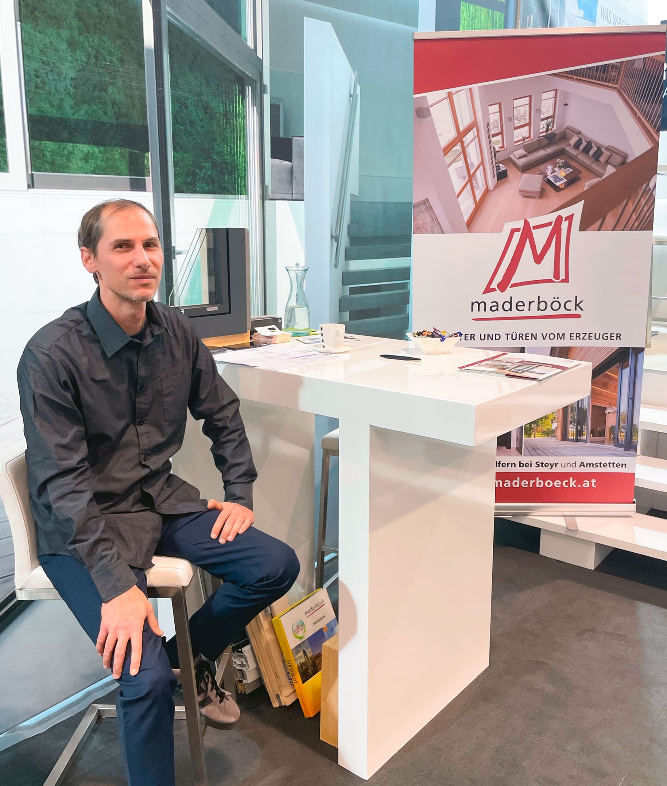 Unser Messestand "exclusive Bauen & Wohnen" mit Maderböck-Mitarbeiter Florian Drabeck auf der „HausBau + EnergieSparen“-Messe in Tulln.