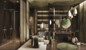 GESSI präsentiert ein großes Badezimmer mit Regenduschen und Handduschen in gold und Doppelwaschtich mit Armaturen in gold.