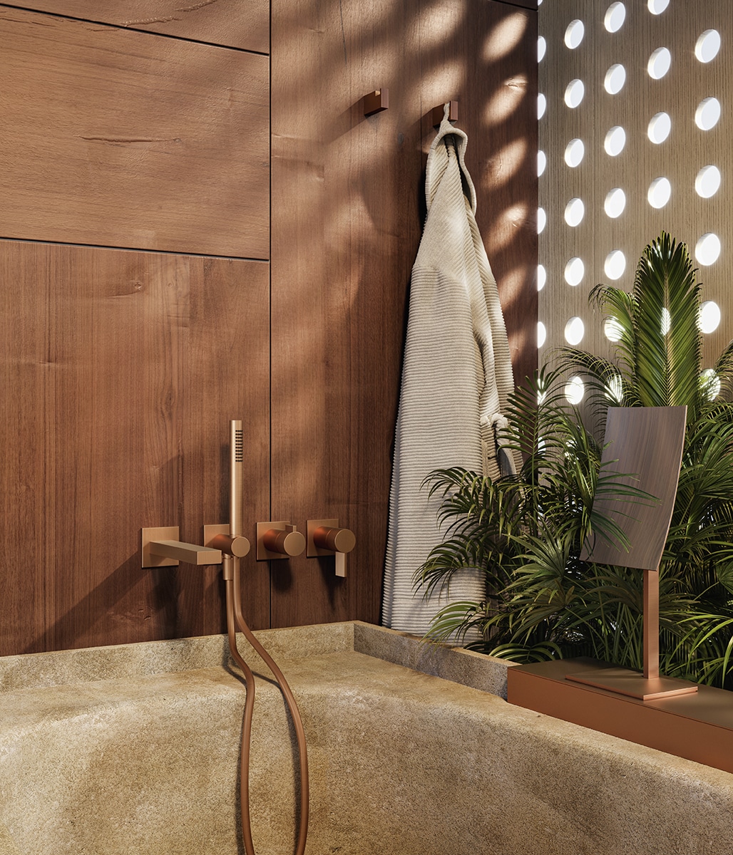Formschöne Badewanne mit geometrischer 4-Loch-Wandarmatur von Gessi aus der Inverso-Kollektion.