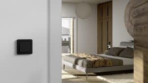 GIRA zeigt ein Schlafzimmer mit einem schwarzen 1fach Wipptaster.