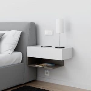 GIRA zeigt ein Schlafzimmer mit weißem glänzenden 2fach Wipptastern.