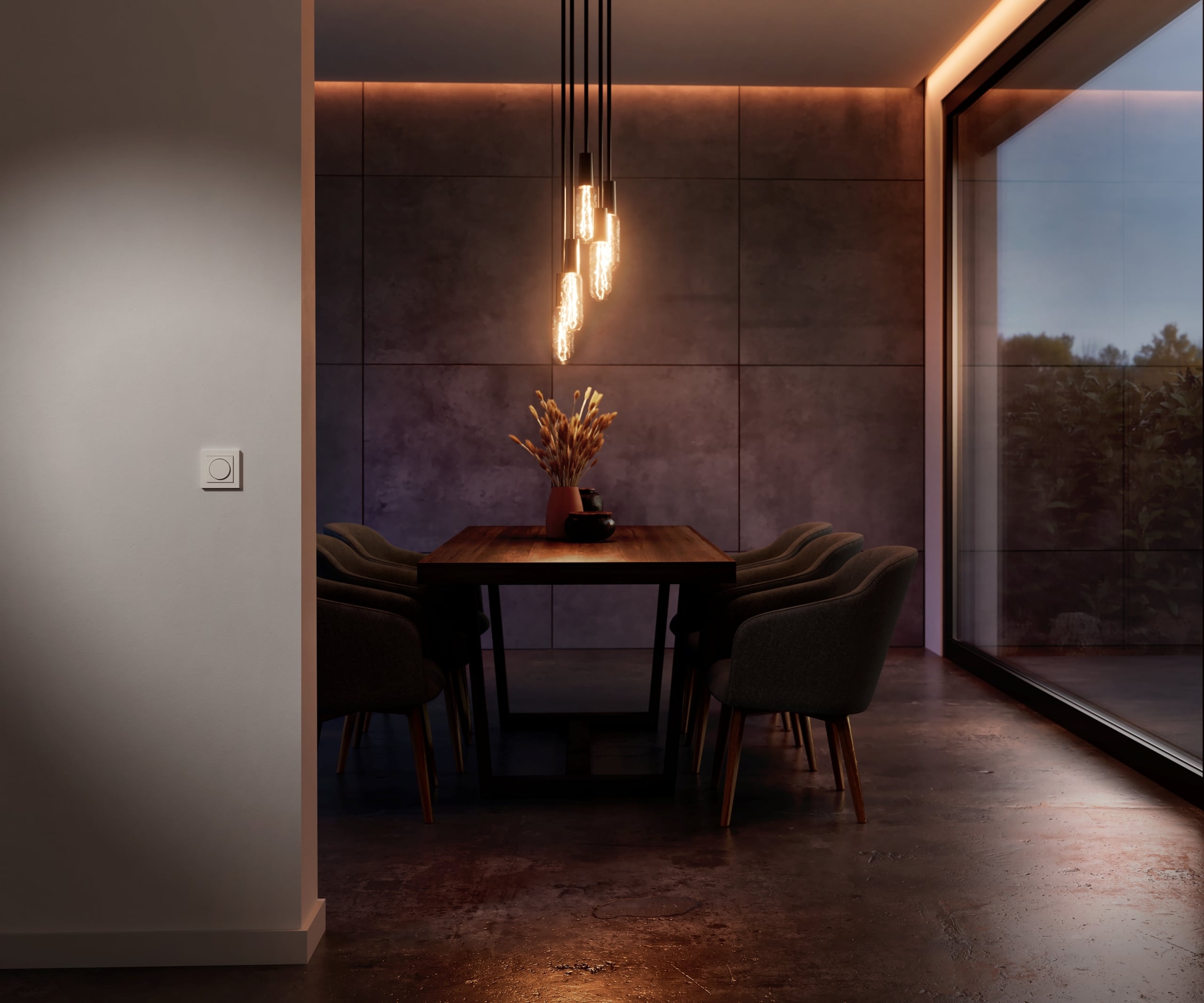Offener Wohnraum mit Mattweissem Drehdimmeinsatz DALI von GIRA auf einer raumteilenden Wand und Blick auf den Essbereich mit herabgesetzter Decke und indirekter gedimmter Lichtleiste und kunstvoller Pendelleuchte über dem Esstisch.