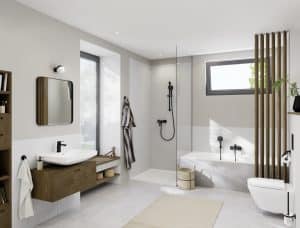 Helles Badezimmer mit Waschtisch aus dunklem Holz, aufgesetztem Waschbecken, Badewanne, Dusche mit Glaswand und WC mit schwarzen Armaturen und Halterungen von Grohe.