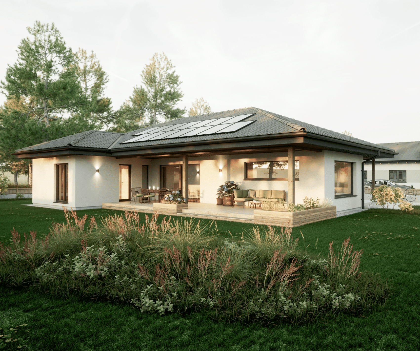 HARTL HAUS zeigt einen modernen, weißen Bungalow mit dunklem Dach, dunklen Türrahmen, Terrasse und Hochbeet.