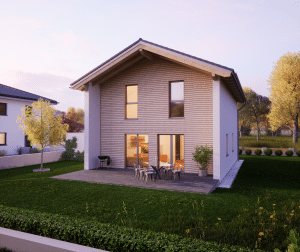 Hartl Haus zeigt Einfamilienhaus mit Satteldach, nach innen versetzter Hausfront mit Terrasse und Garten bei Abendstimmung.
