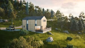 Ein Satteldachhaus mit Holzfassade, Eckverglasung, Terrassenschiebetüren, Terrassengeländer aus dunklem Rauchglas mit wundervoller Aussicht von HARTL HAUS.