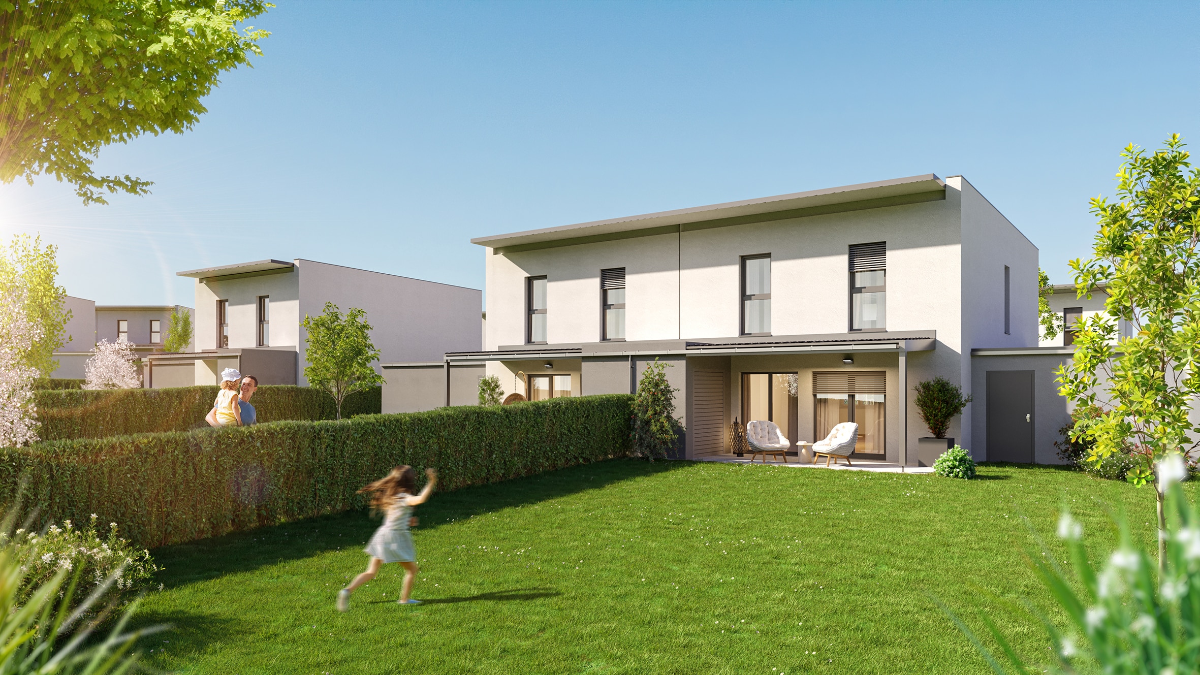 Nahaufnahme einerr modernen Reihenhaussiedlung mit begrünten Gärten, Terrassen und harmonischer Architektur in natürlicher Umgebung, geplant von HARTL HAUS.