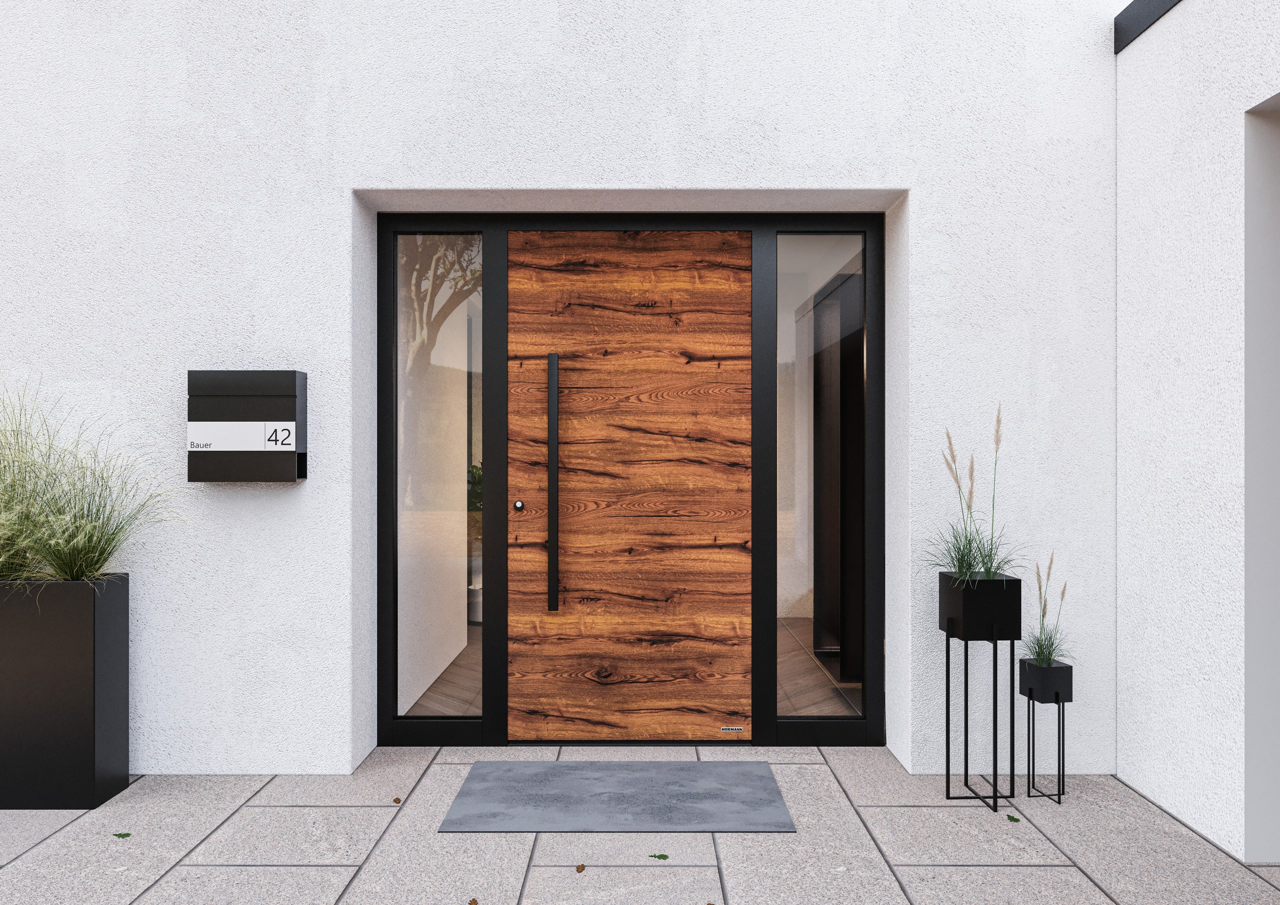 Aluminium-Hauseingangstür mit Holzdekor von Hörmann Austria.