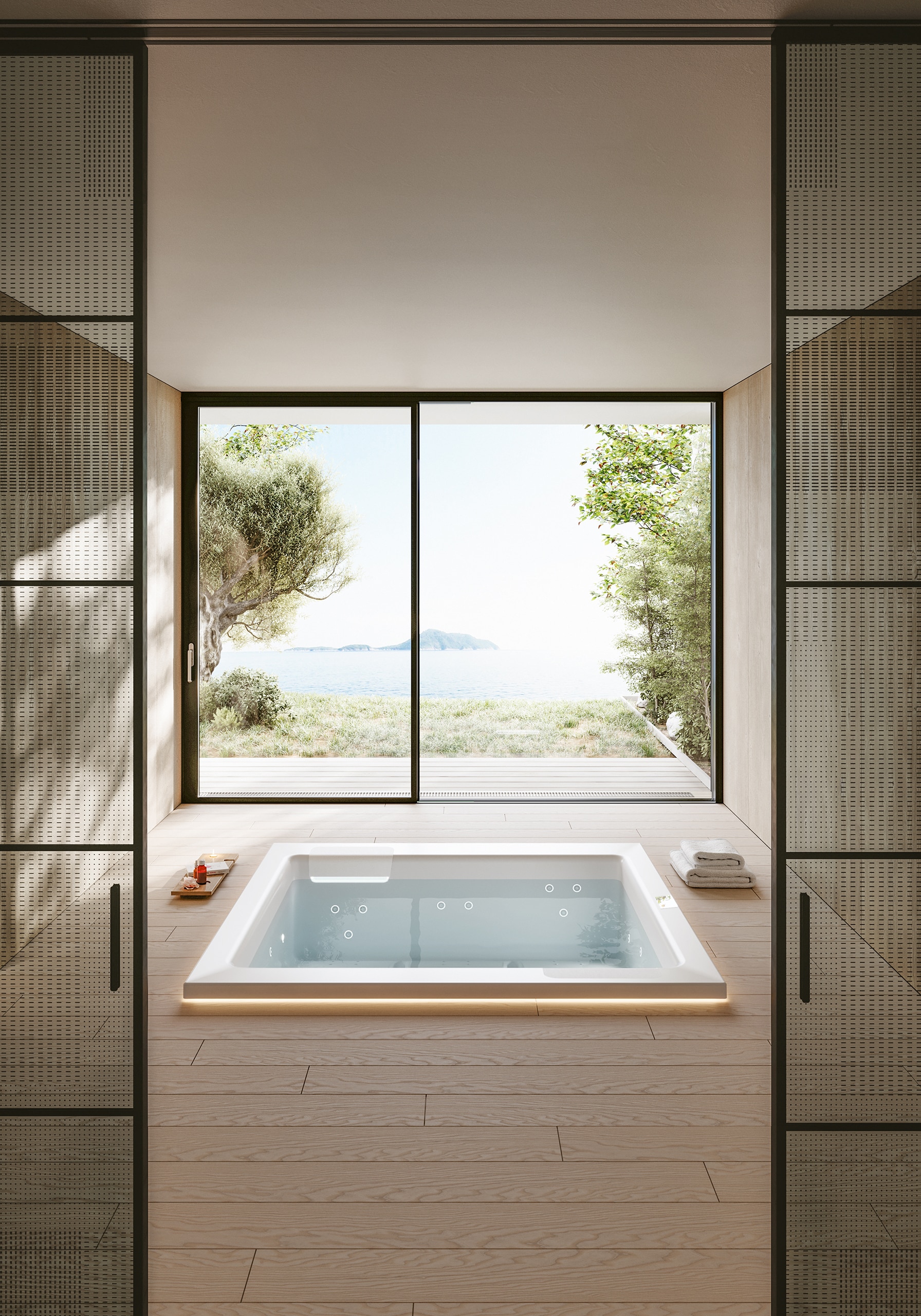 Der quadratische weiße Outdoor-Whirlpool "Gilium" mit beleuchtetem LED-Rand von Disenia - hier in der Unterbauversion in einem japanisch-minimalistisch gestalteten Haus mit barrierefreiem Terrassenzugang.