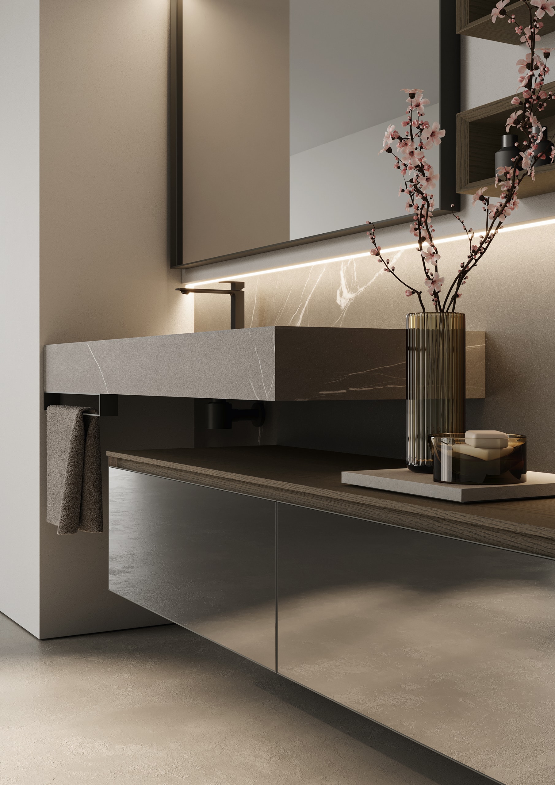 Idea Group zeigt einen Waschtisch aus dunklem Holz mit an der Wand montiertem kubistischen graumarmorierten Waschbecken mit Handtuchhalterung und einem Unterschrank mit Spiegelglasfront.