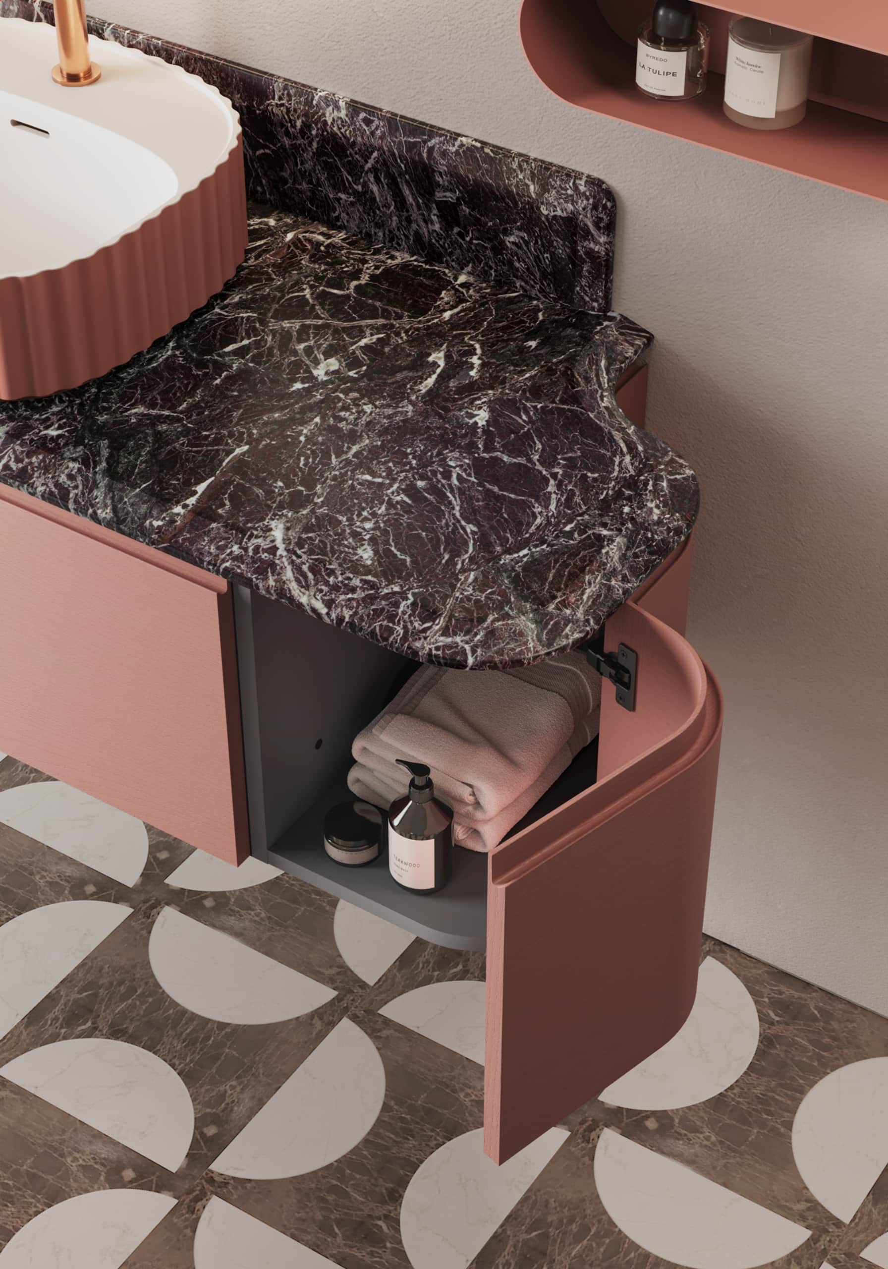 Ideagroup präsentiert einen eleganten Waschtisch mit Mamorplatte und rötlichem Holz-Unterschrank mit abgerundeten Kanten, der geöffnet ist.