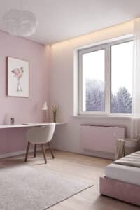 Jaga zeigt die Raumklimalösung Briza, die kühlt und heizt, in Rosa als Wandmontage in einem Kinderzimmer.