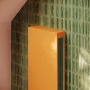 Detailansicht eines orangen VertiLina Net Zero Wärmepumpen-Heizkörper von Jaga.