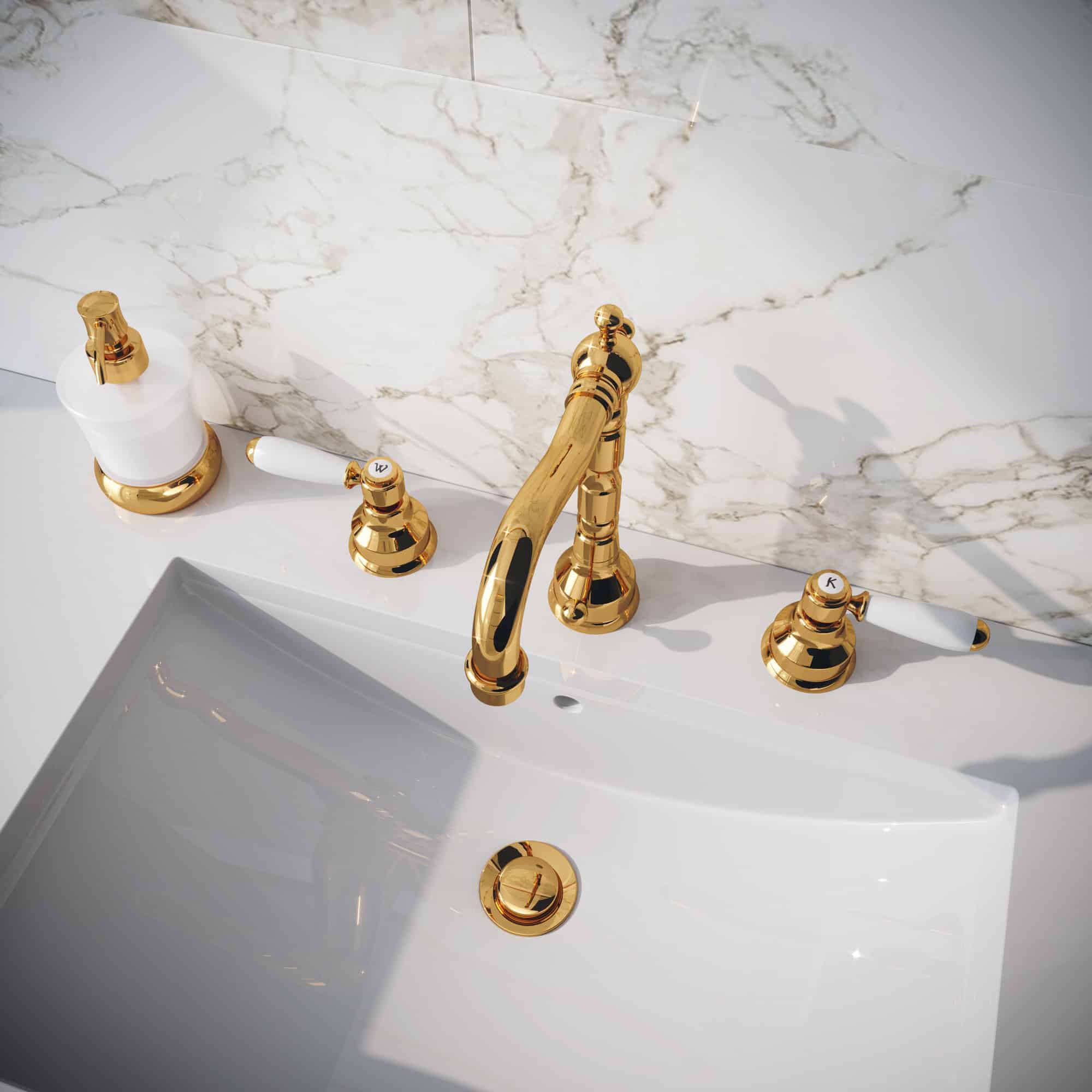 Ein Waschtisch mit 3‑Loch‑Batterie und Warm- und Kalt-Hebelgriffen mit weissem Porzellan in Gold und passendem Seifenspender von Jörger.