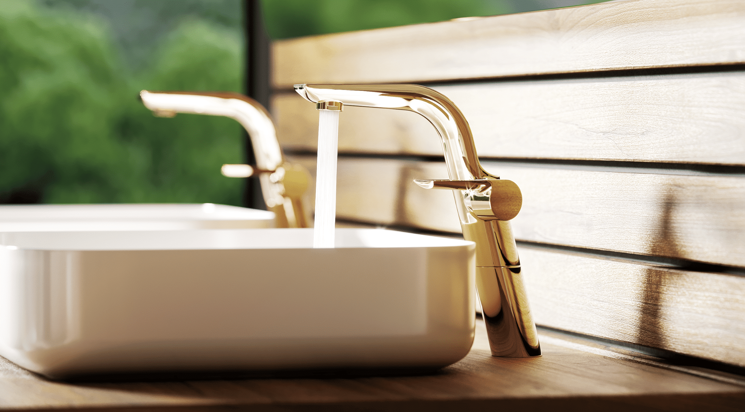 Luxus und Leichtigkeit: „Exal“ in Edelmessing setzt goldene Akzente und wirkt durch den verlängerten Körper extra dynamisch und modern. Das filigran designte Aufsatzbecken in schlichtem Weiß scheint zu schweben und lässt die Armatur schön strahlen