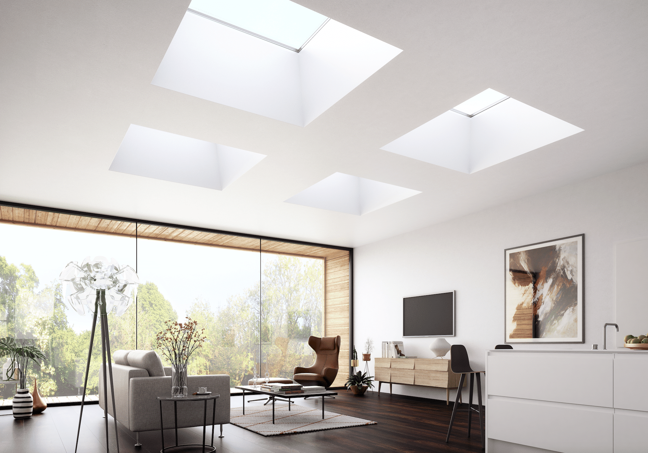 Ein modernes Wohnzimmer mit großen Glasfronten und Fenstern in der Decke die für viel Tageslicht sorgen von Lamilux.
