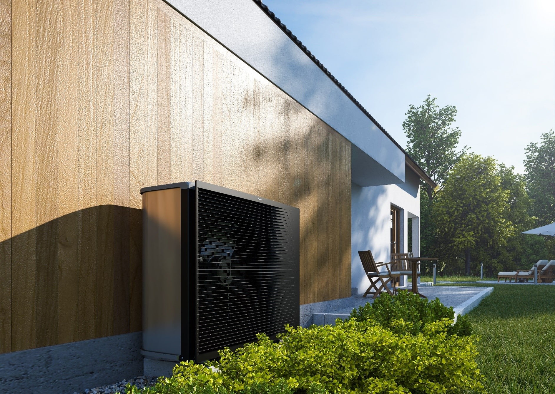 Daikin Wärmepumpe im Außenbereich auf einem Betonsockel montiert gezeigt von Limbach.