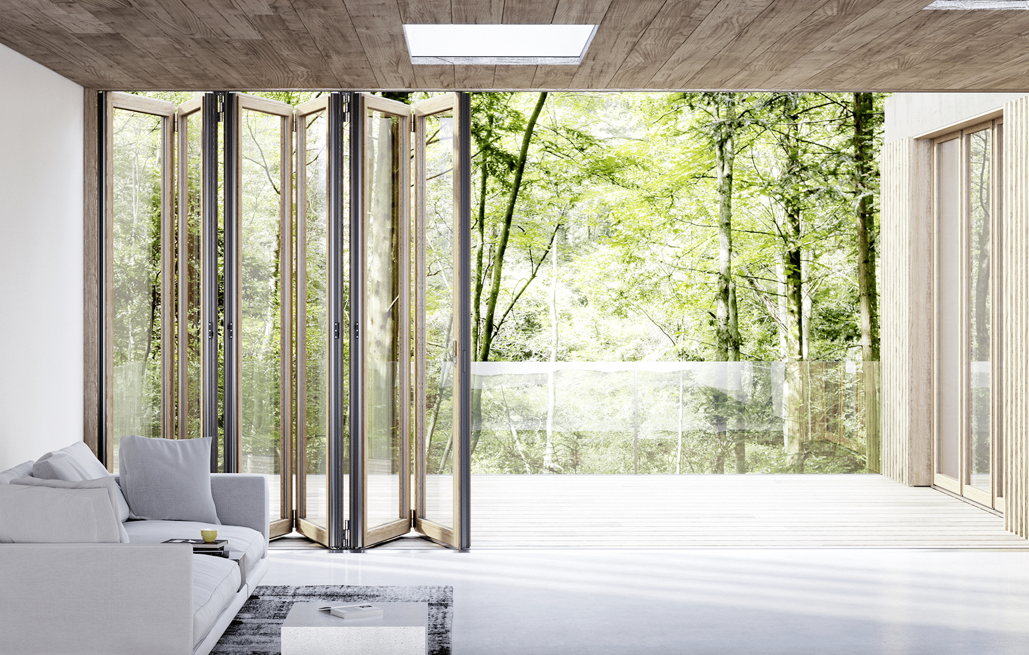 Balkonzugang über die Glas-Falttüren von Solarlux.