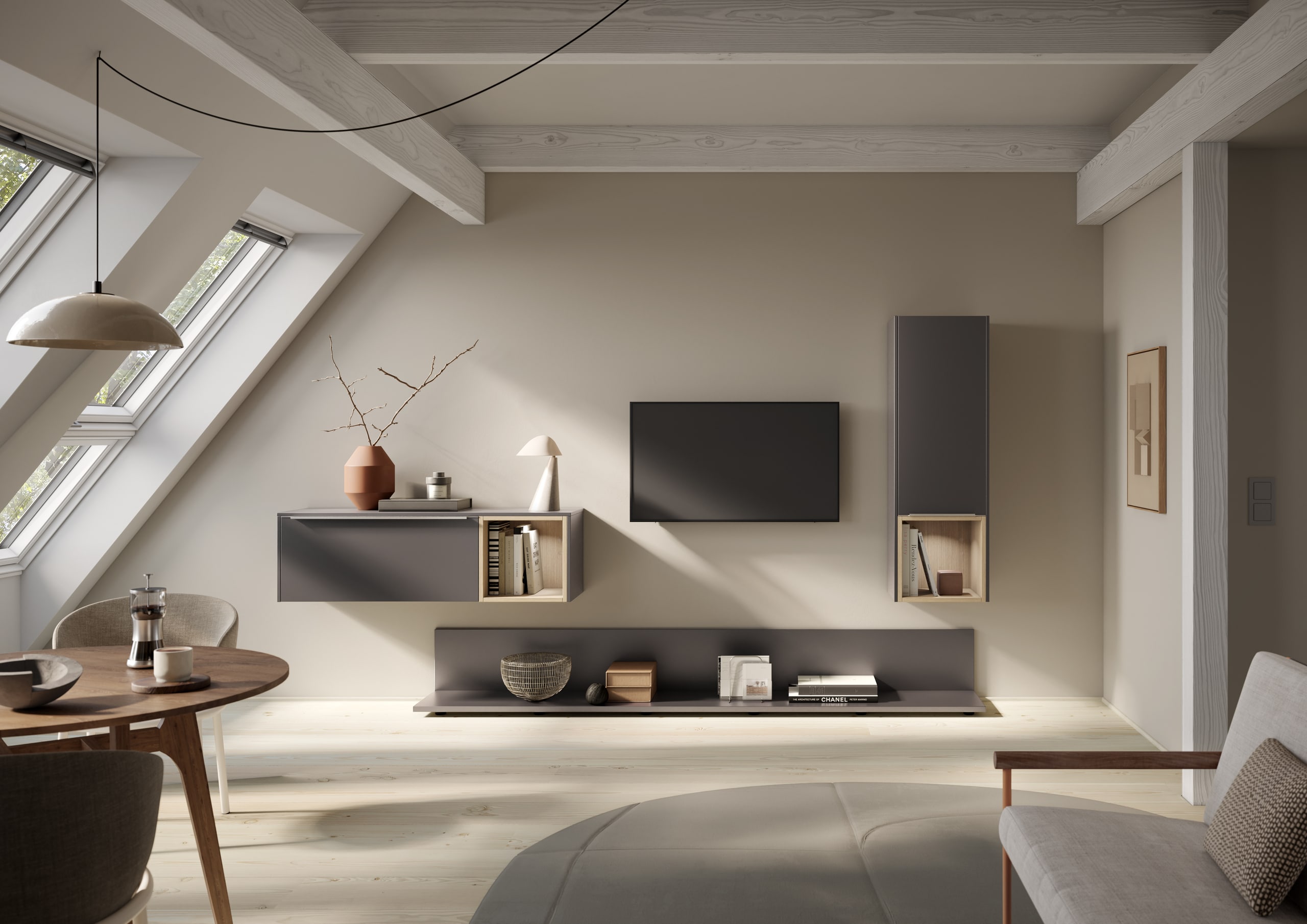 Bauer Tischlerei zeigt Wohnwand mit dunkelgrauen schmalen Wandschränken mit offenen Boxen und bodennahes Regal von Häcker Küchen.