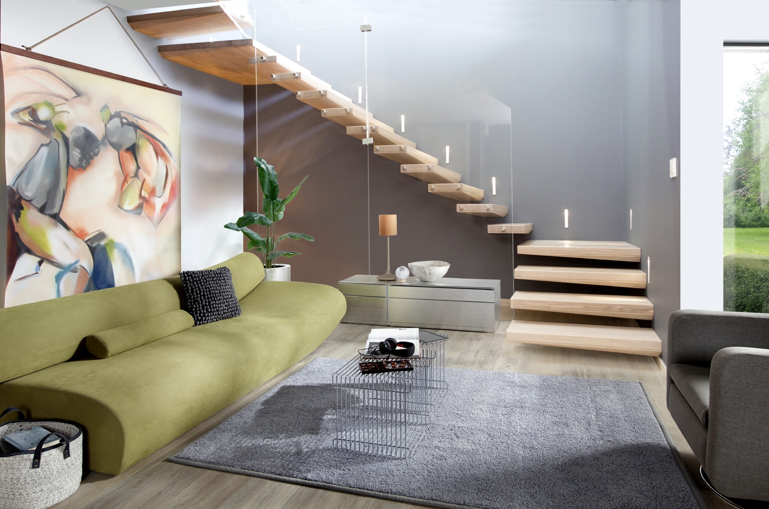Moderne schwebende gewendelte Kragarmtreppe mit Glaswandgeländer in minimalistischem Loftdesign von Treppenmeister.