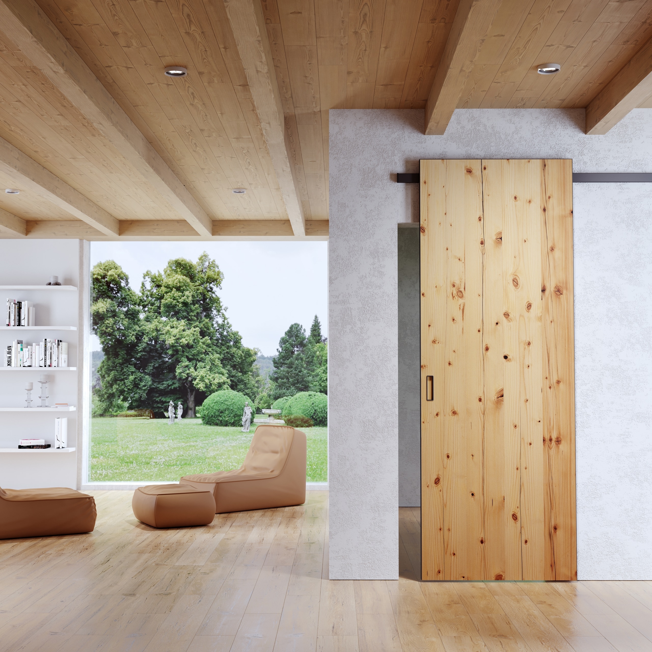 Offener Wohnraum mit Holzbalkendecke, Deckenspots, Bücherregal, Loungemöbeln, bodentiefem Panoramafenster und einer Schiebetür in rustikalem Kiefernholz mit Griffschale auf einer schwarzen Wandschiene von WIENTÜR91.
