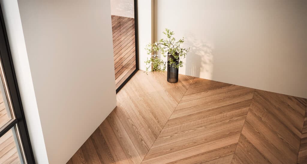 Moderne Raumgestaltung einer Wohnung bzw. leeres Wohnzimmer mit weißen Wänden und hochwertigem Parkettboden aus Massivholz in Fischgrätverlegung und Fenstern mit Blick auf die Holzterrasse.