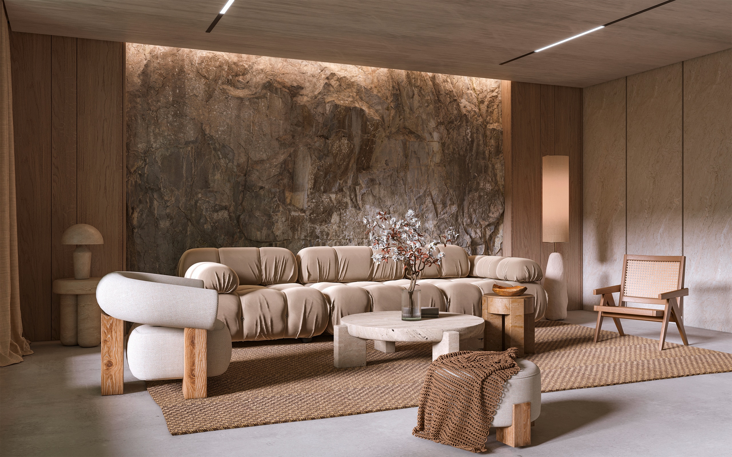 Exklusives Wohnzimmer in Naturtönen mit einem gemütlichen Sofa, einem Wohnzimmertisch aus hellem Stein, darunter ein Teppich aus braunem Sisal und einer beleuchteten Steinwand im Hintergrund.